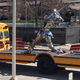 Illustration for article titled Flat-Bed School Bus Carries Chrome Knight, Political Message Around GA